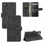 Voor BlackBerry KEY2 Solid Color Skin Feel Magnetic Buckle Horizontal Flip Calf Texture PU Leather Case with Holder & Card Slots & Wallet(Black)