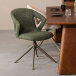 Bootcut eethoek tafel zwart en 6 berit stoelen beige.