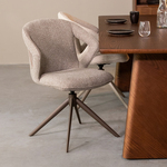 Bootcut eethoek tafel zwart en 6 Velvet stoelen beige.