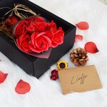 15 roze rozen met gipskruid