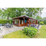 5-persoons bungalow met omheinde tuin en privacy op de Veluwe met een zwembad op het park