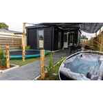 Bubbelbad en grote trampoline bij comfortabel 6p chalet op vakantiepark