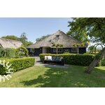Sfeervol 8 persoons vakantiehuis met een bubbelbad in de tuin in Ommen