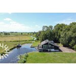 8 tot 10 persoons woonboerderij in hartje Giethoorn met gratis WiFi.