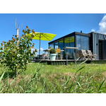 Prachtige 2 persoons glamtainer in Friesland aan het water.